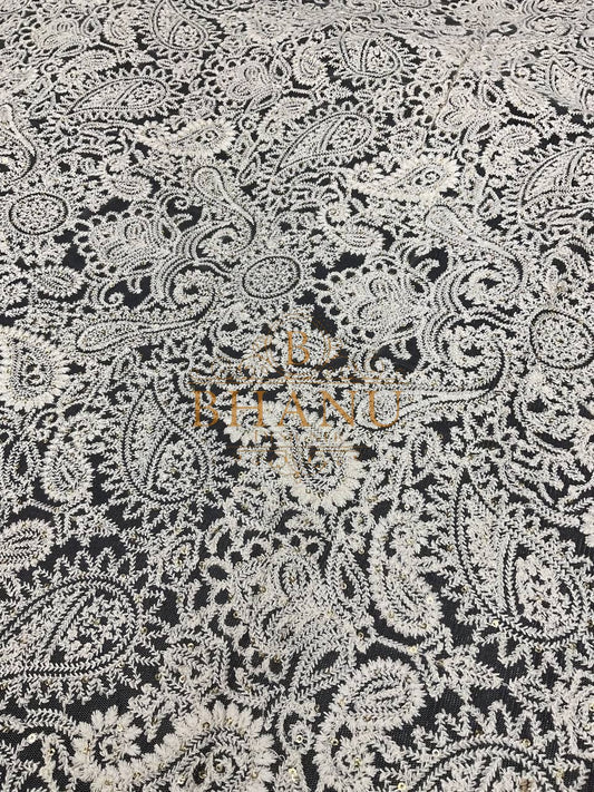 Ivory with paisley cutwork - fabric by the metre