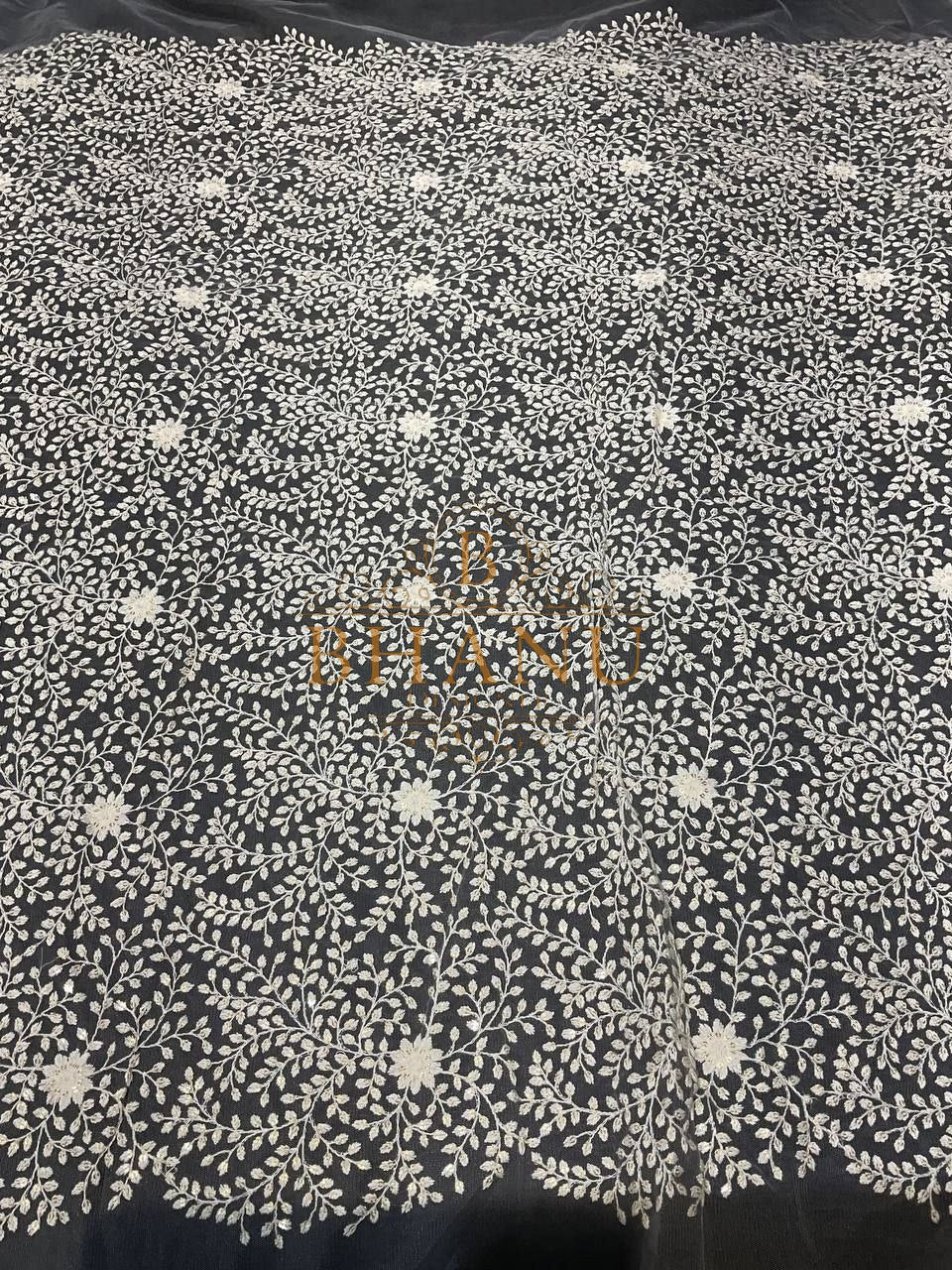 Ivory with fine floral cutwork - fabric by the metre
