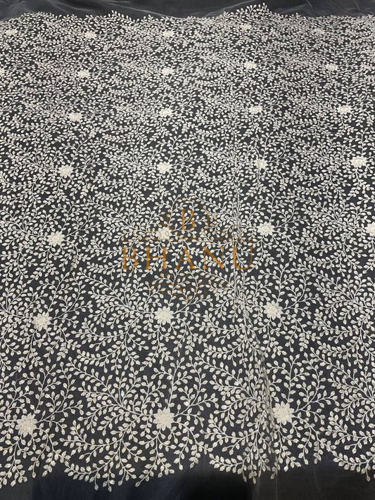 Ivory with fine floral cutwork - fabric by the metre