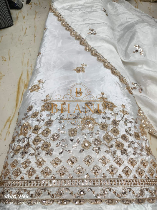 White satin with a gold sequin scalloped hem - fabric by the metre