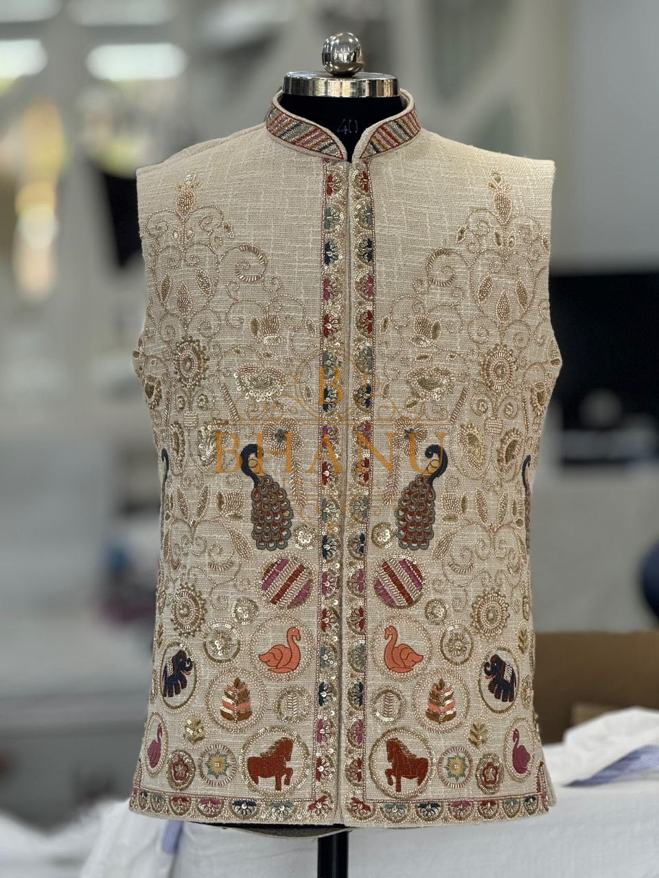 Cream with peacock and animal embroidery at the front - nehru jacket