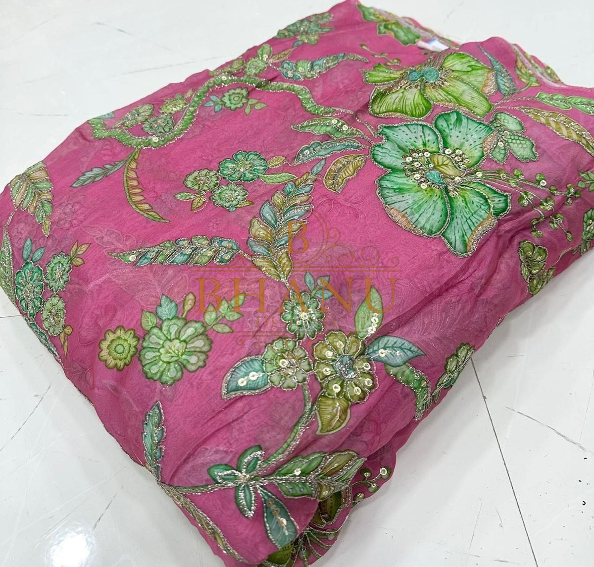 Pink with green floral work - fabric by the metre