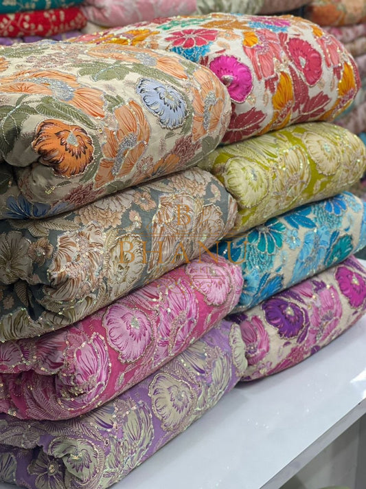 Floral work, several colourways - fabric by the metre