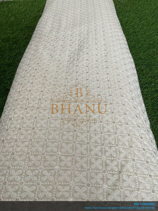 Ivory with tonal cutwork, on the roll - fabric by the metre