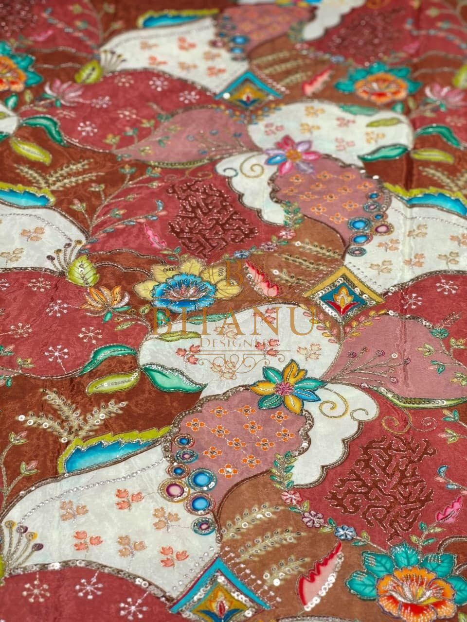 Red and cream with a multicolour Mughal print - fabric by the metre