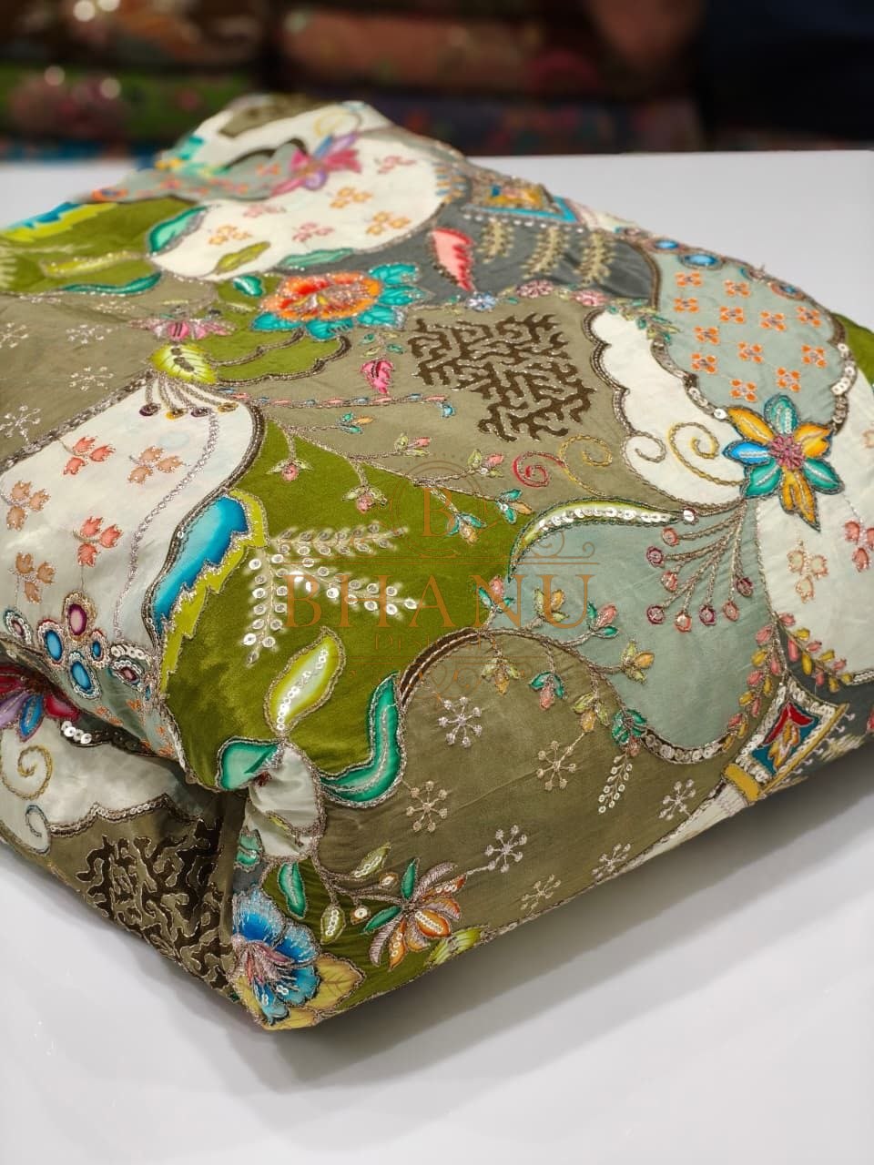 Olive and cream with a multicolour Mughal print - fabric by the metre