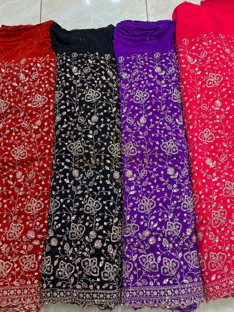 Bandhani in red, black, purple and pink - fabric by the metre