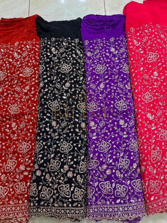 Bandhani in red, black, purple and pink - fabric by the metre