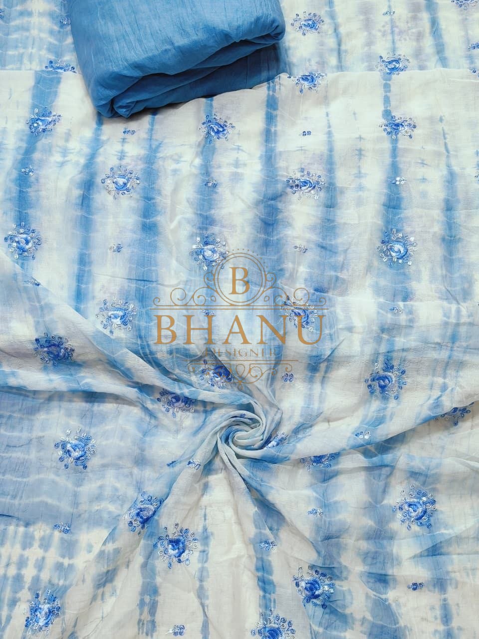 Blue tie-dye with floral embroidery - fabric by the metre