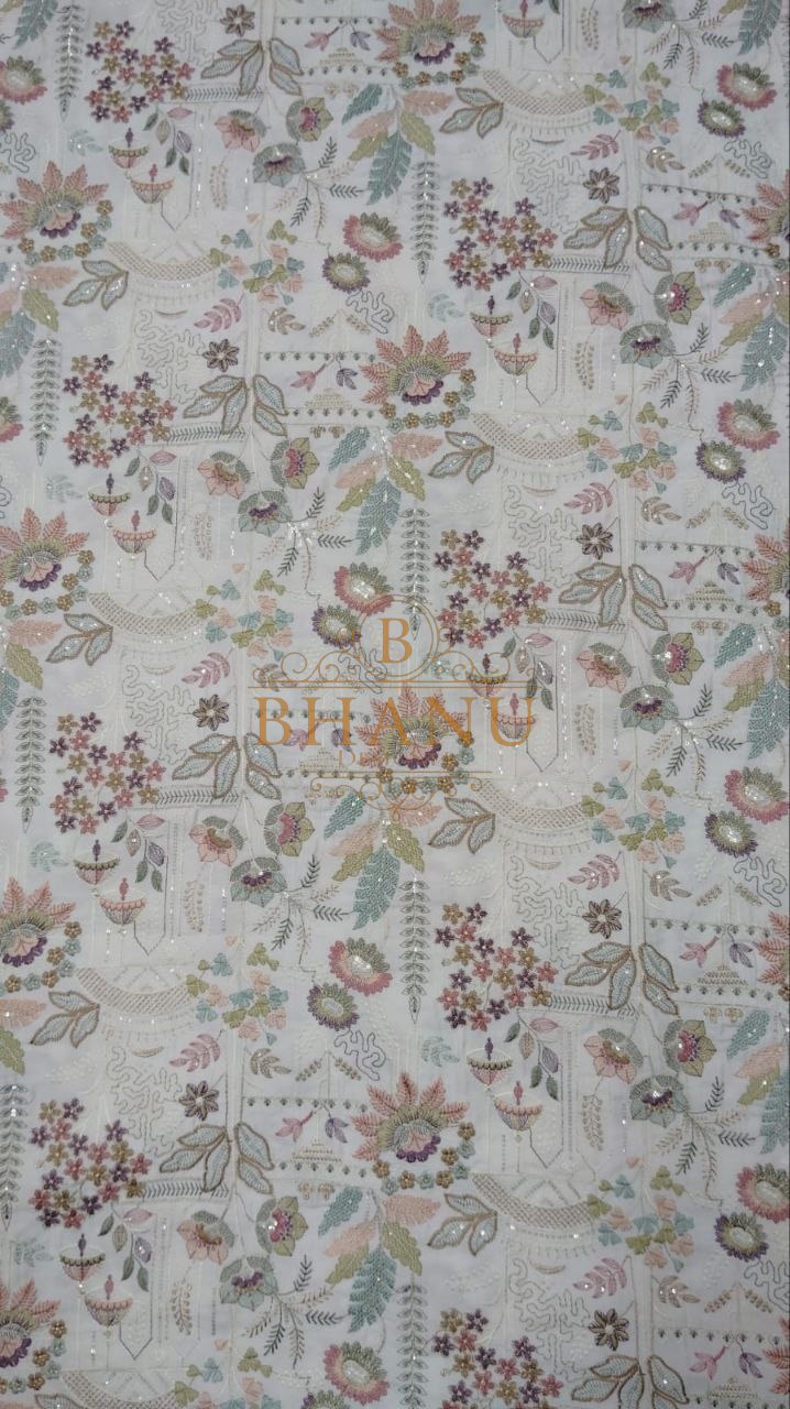 Pale ground with a fine floral print - fabric by the metre