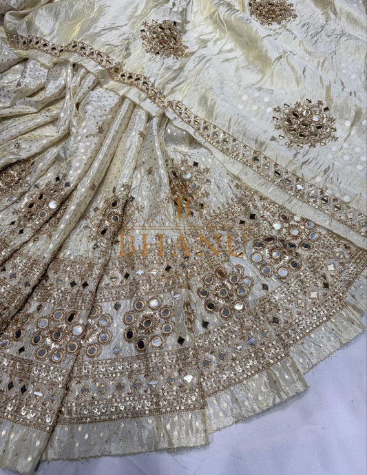 Cream with a gold mirror and sequin hem - fabric by the metre