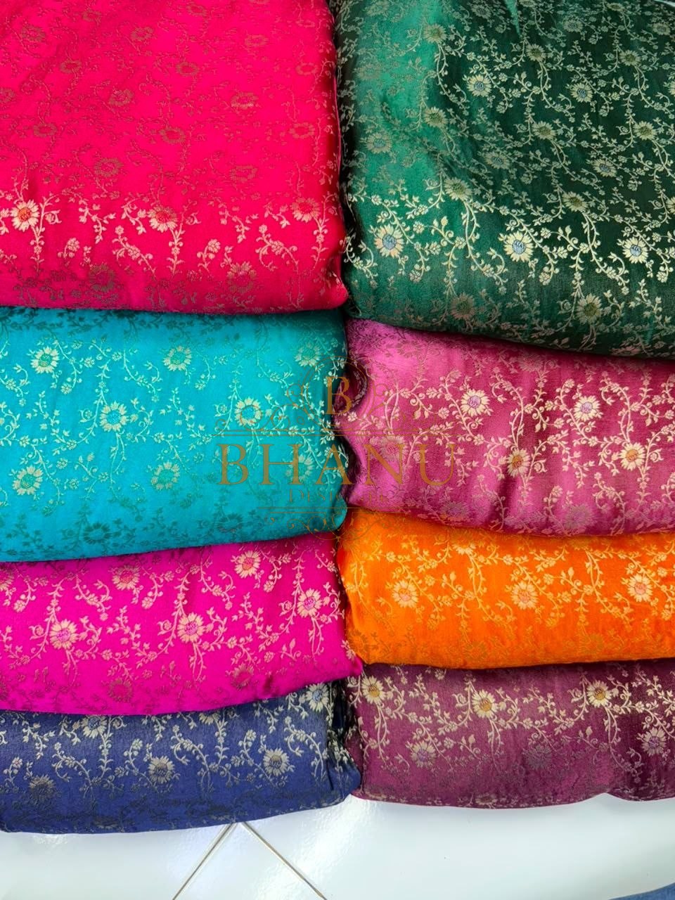 Brocade in pink, teal, orange and navy - fabric by the metre