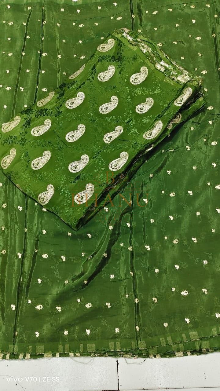 Green with a white paisley print - fabric by the metre