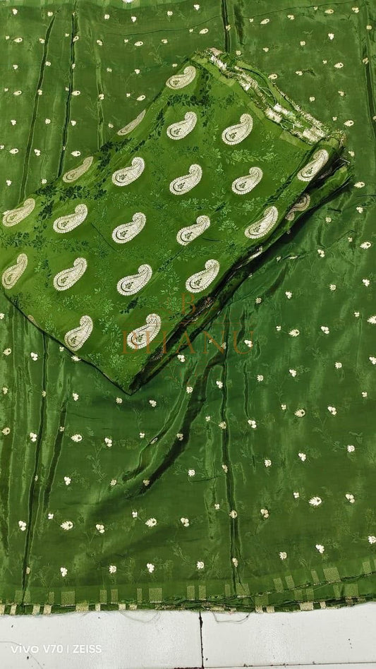 Green with a white paisley print - fabric by the metre