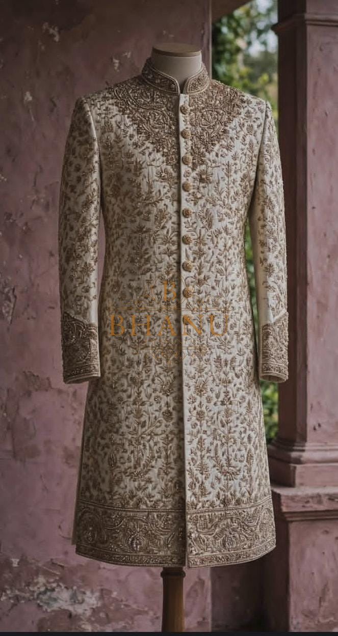 Ivory sherwani worked tone on tone over the whole garment