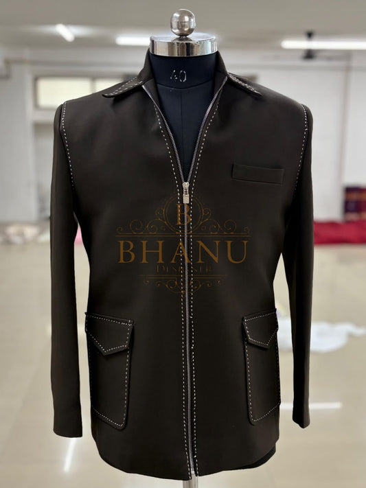 The zip-front jacket on a mannequin in the workshop