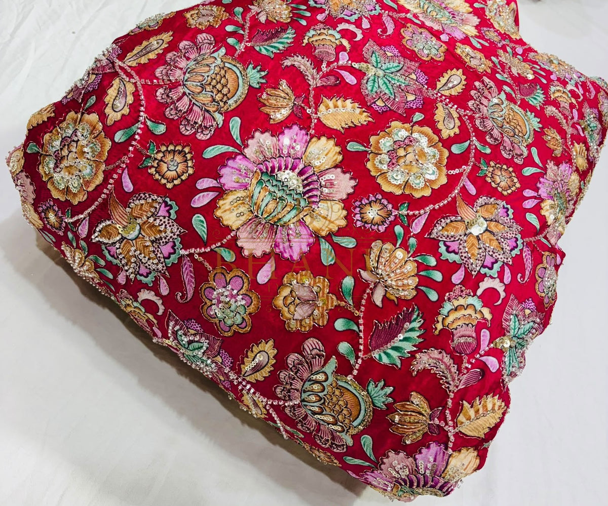 Dense multicoloured floral and paisley work with beads and sequins