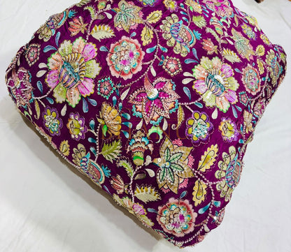 Dense multicoloured floral and paisley work with beads and sequins