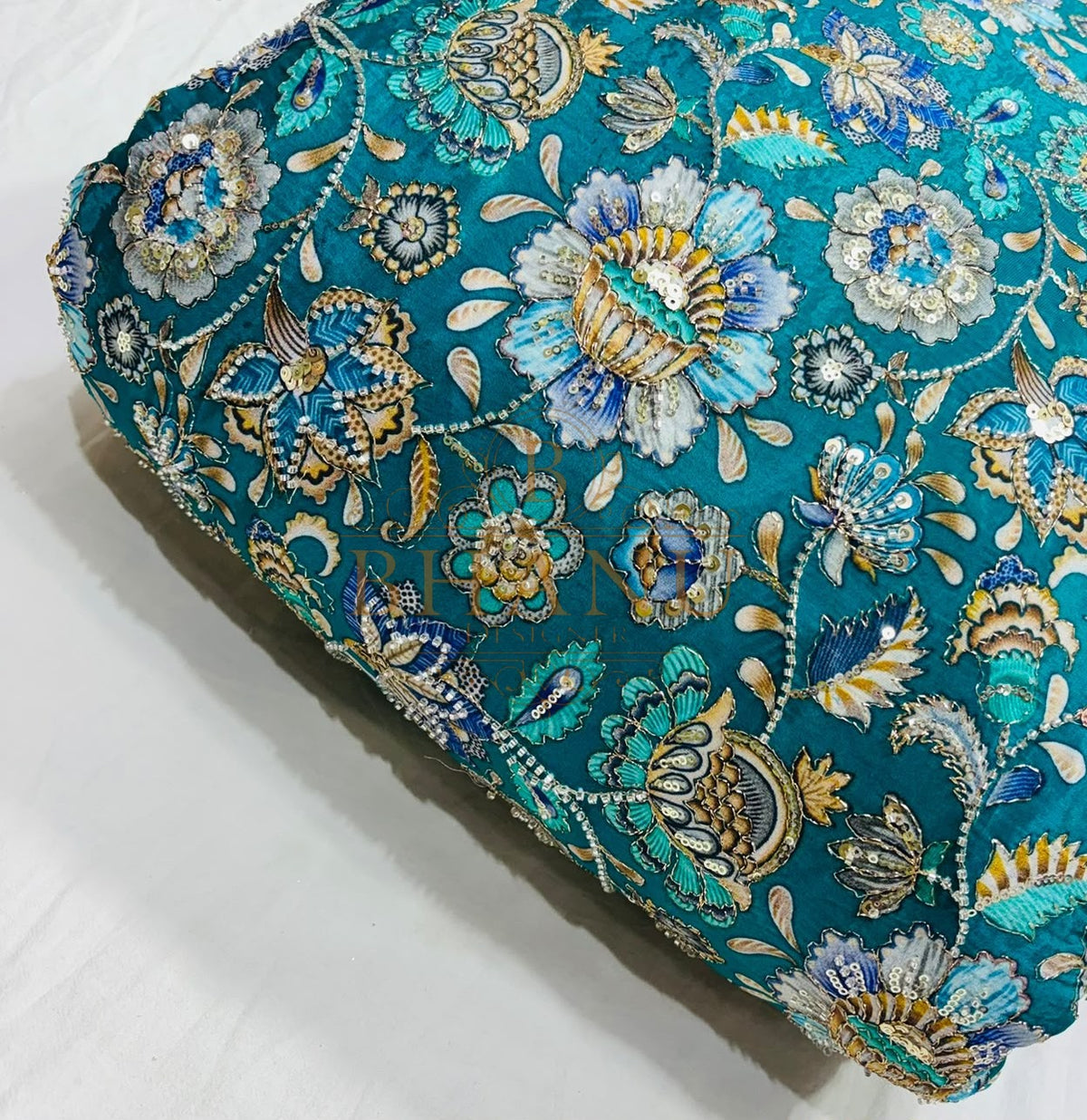Dense multicoloured floral and paisley work with beads and sequins