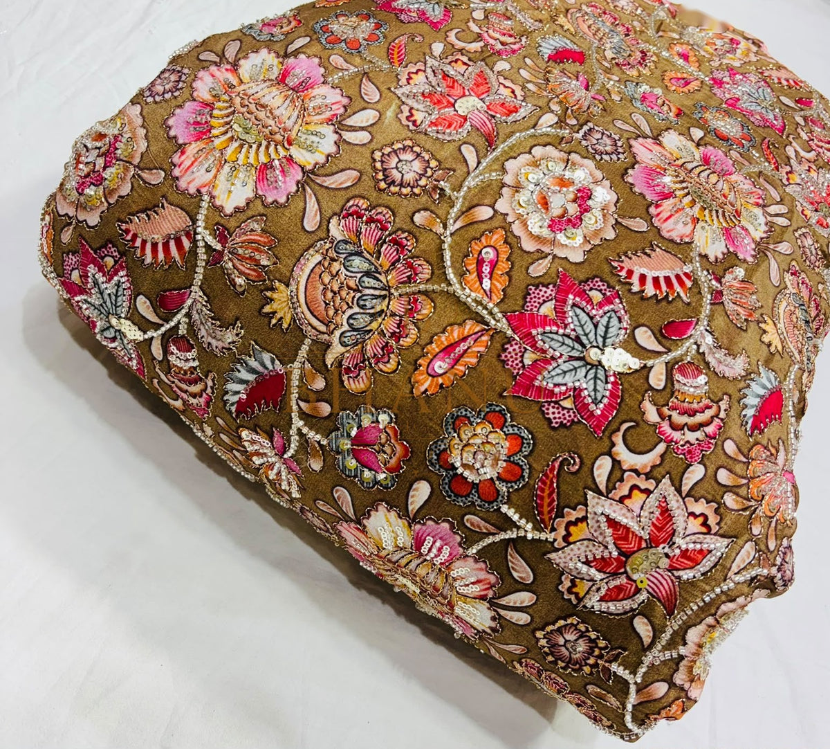 Dense multicoloured floral and paisley work with beads and sequins