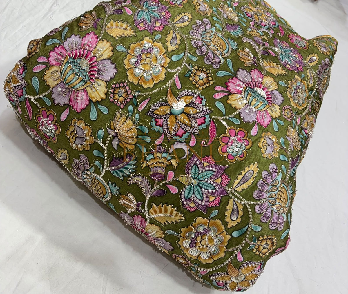 Dense multicoloured floral and paisley work with beads and sequins