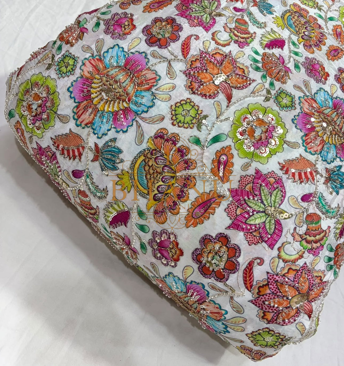 Dense multicoloured floral and paisley work with beads and sequins