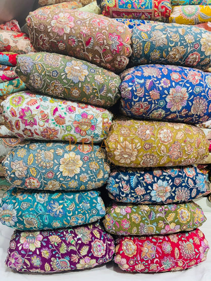 Dense multicoloured floral and paisley work with beads and sequins