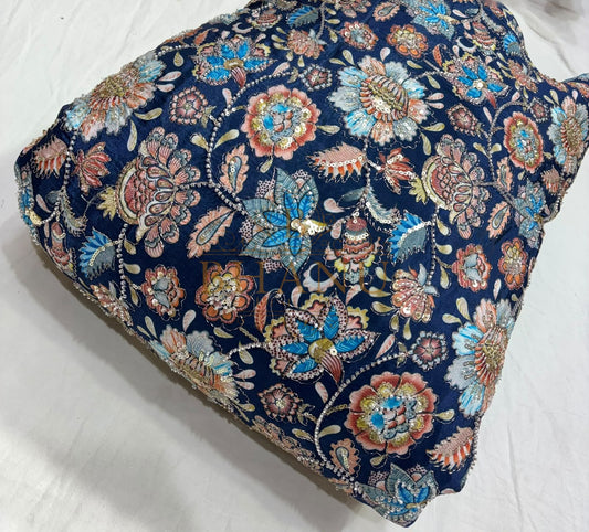 Dense multicoloured floral and paisley work with beads and sequins