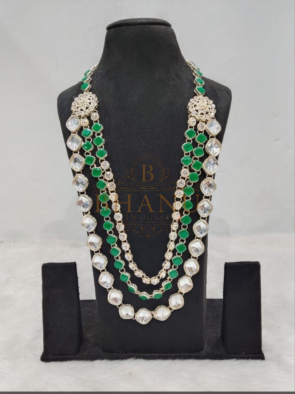 Emerald green beads strung with pearl and kundan spacers - mala