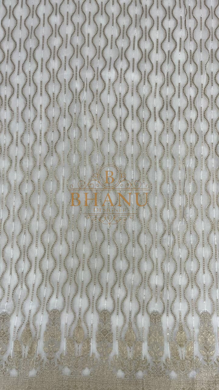 Ivory with vertical gold wave embroidery - fabric by the metre