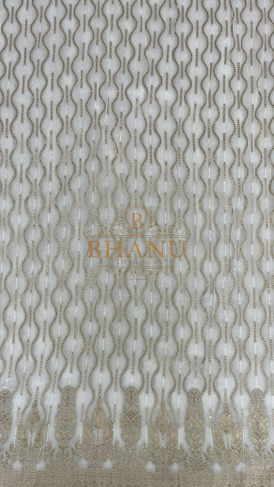 Ivory with vertical gold wave embroidery - fabric by the metre